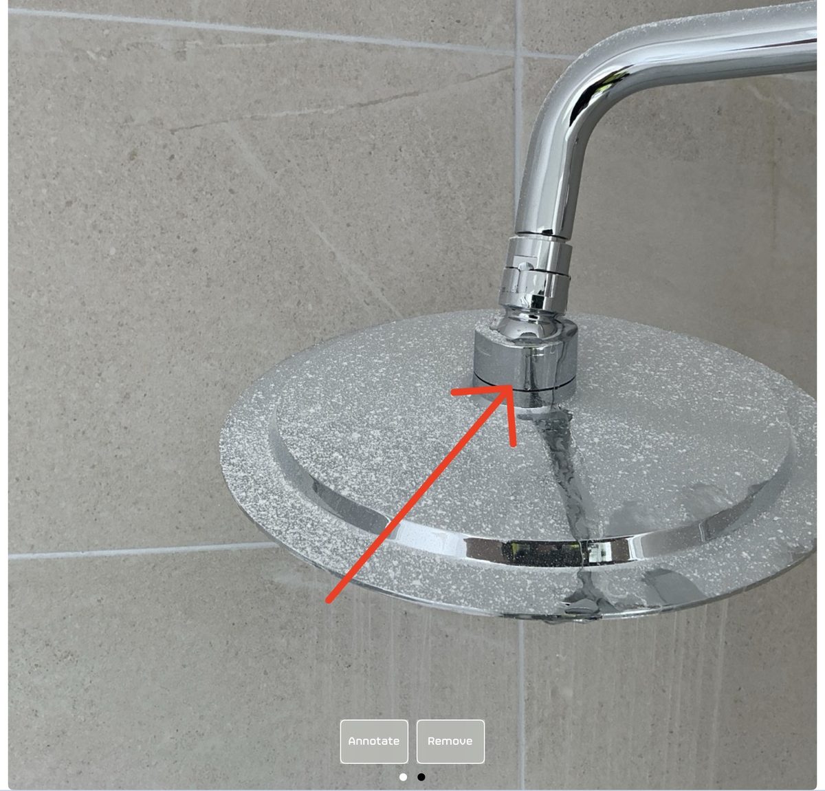 Leak at the base of a 2nd-floor en-suite shower head