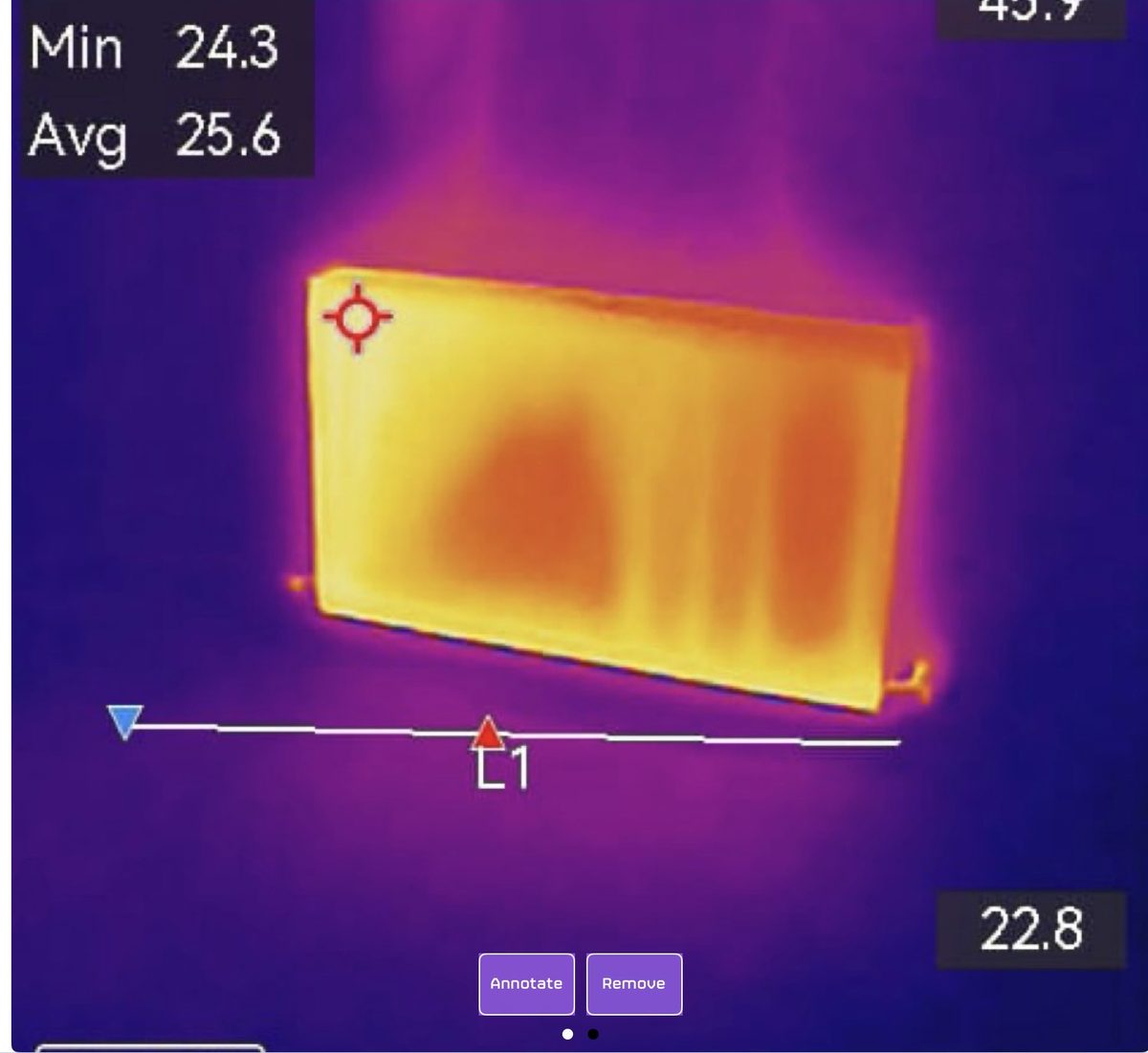 Thermal-imaging scan of a master bedroom radiator showing uneven heat distribution